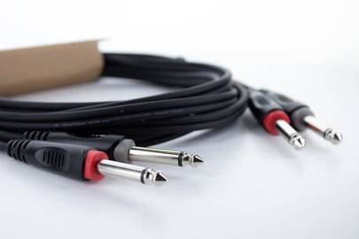 Three jack cables with black cable and red ring on white background.