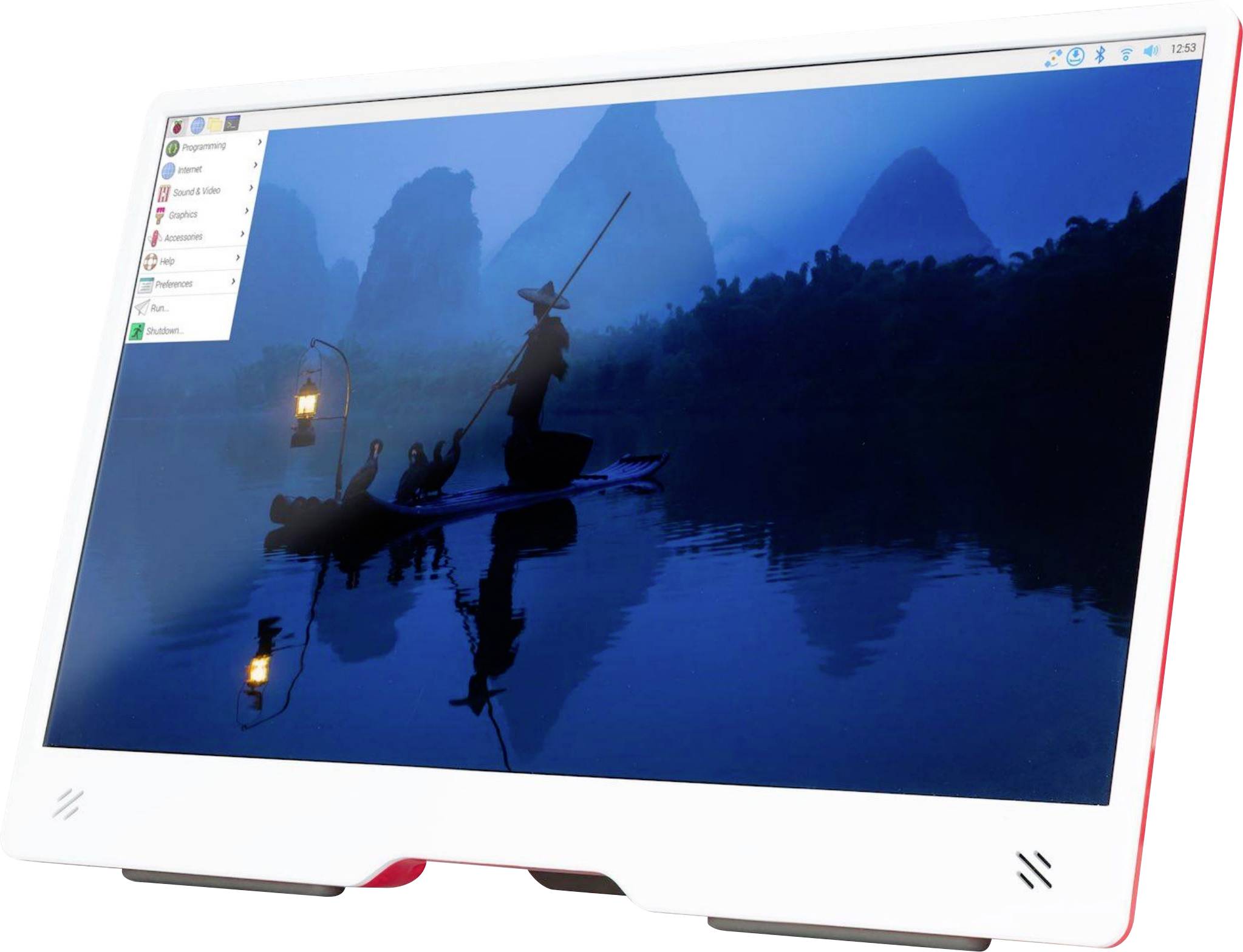 A monitor displays an image of fishermen in a boat at sunset, depicting a tranquil landscape with mountains in the background.