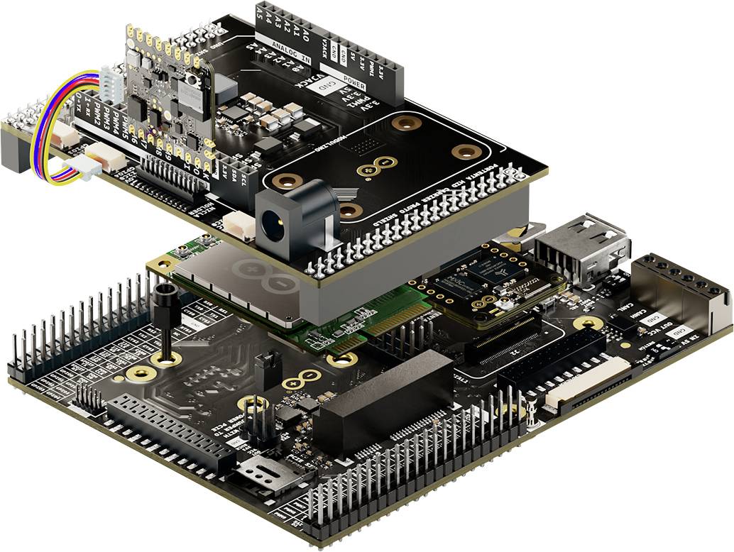 Exploded view of multiple stacked printed circuit boards with various electronic components and connections, demonstrating a modular design.