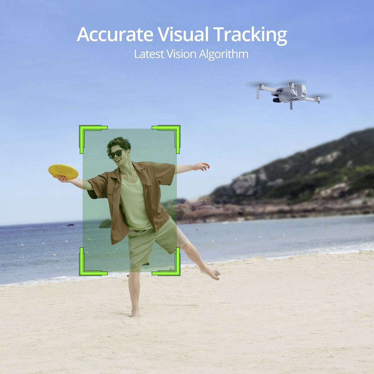 A man on the beach throws a frisbee while a drone hovers in the air. Text: 