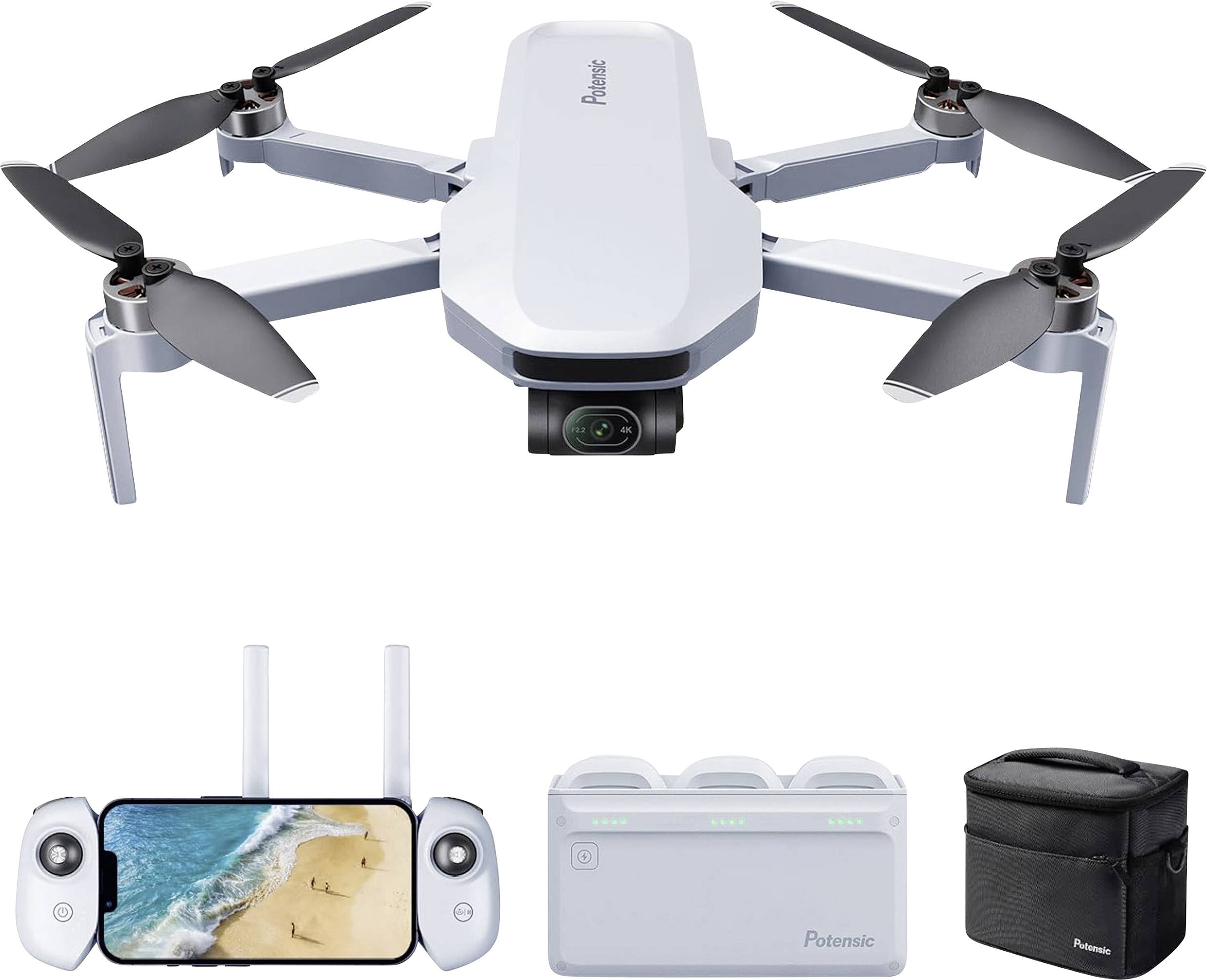 A drone with a camera, two remote controls, charger and carry case. The drone shows a beach on the smartphone display.
