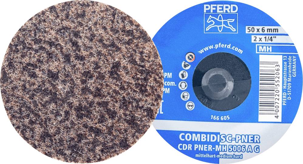 Grinding grain surface of a roughing disc for metalworking. Product label with brand, specifications, and manufacturer information.