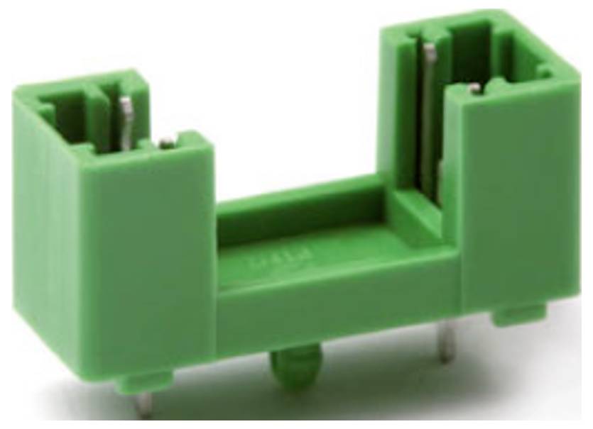 Green electrical connector with two slots, vertically mounted.