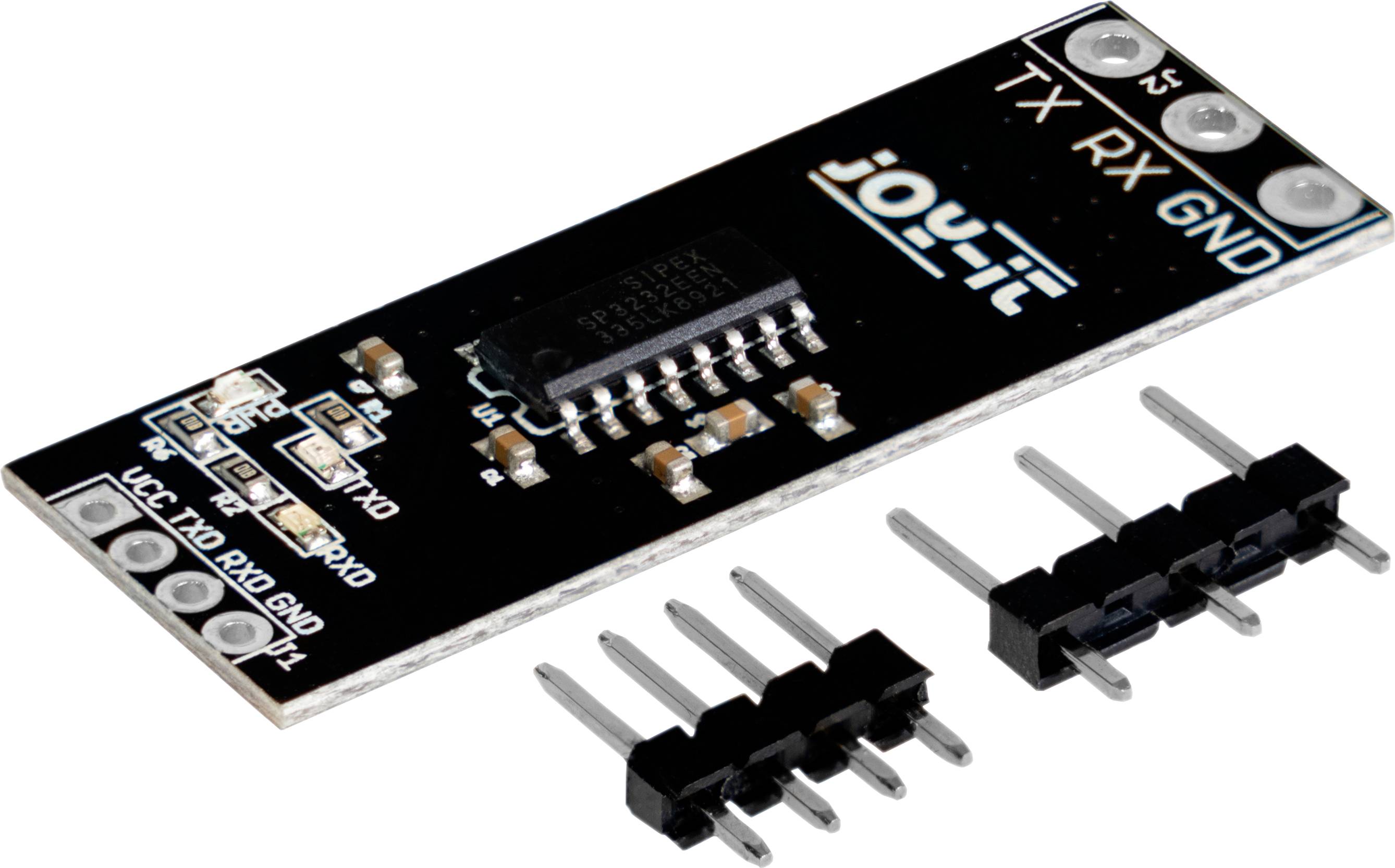 A black electronic module with a chip and pin headers. Text 'TX RX GND' is visible. Connector for connection or mounting alongside.