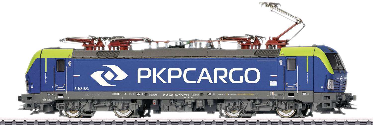 Electric locomotive from PKP Cargo in blue and green on railway track, side view. Prominent logos and overhead lines visible.