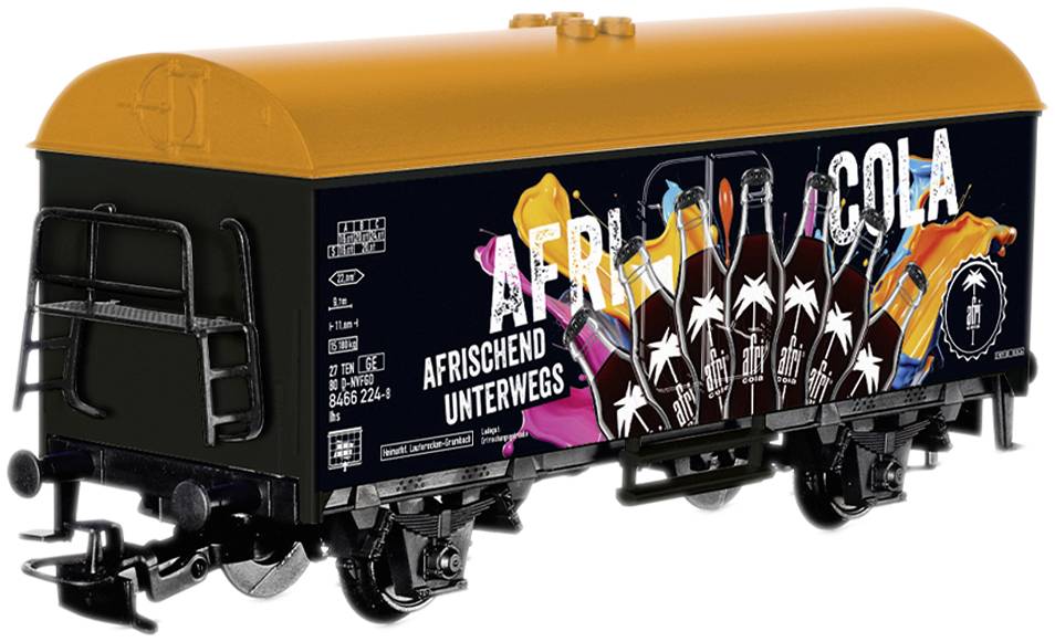 Toy goods wagon with 'Afri Cola' motif in black and orange. Inscription: 'Afri Cola' and 'Refreshing on the Move' with palm trees.