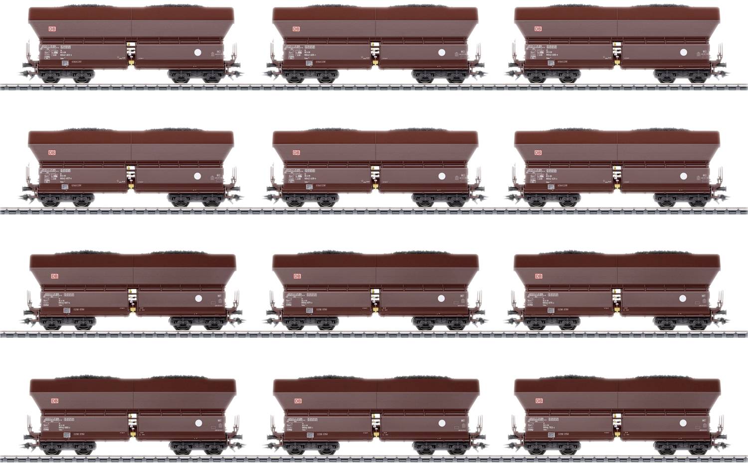 Twelve brown goods wagons on railway tracks in three rows. Each wagon is identical and empty, against a white background.