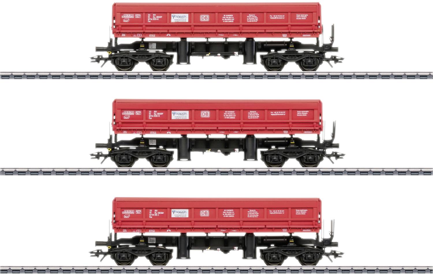 Three red Deutsche Bahn freight wagons in a row on the tracks, pictured from the side, showing logos and technical details.