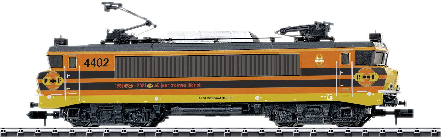 A locomotive in orange, numbered 4402 with Dutch Railways anniversary logos on its sides, stands on the tracks.