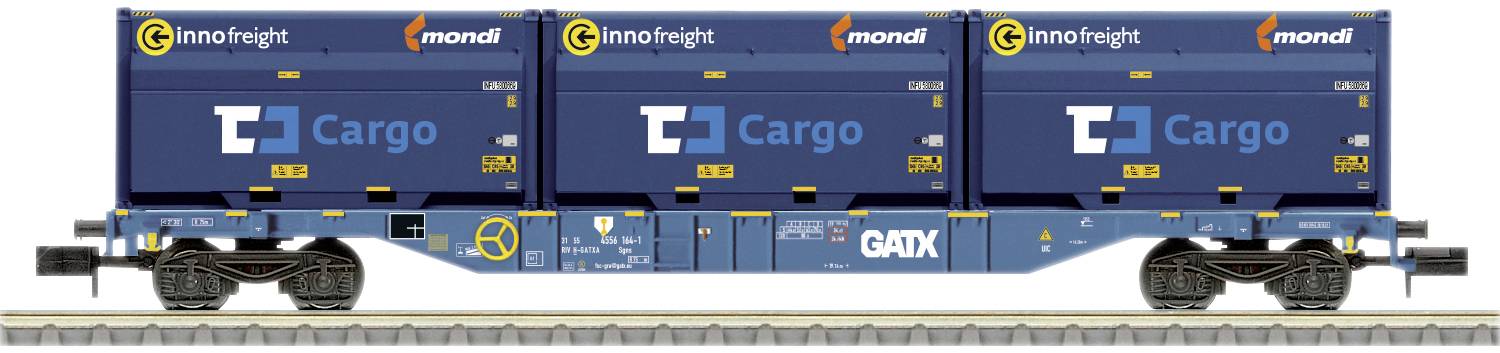 A blue freight train wagon with three large container structures, labelled with 'Innofreight', 'Cargo', 'GATX' and 'mondi'.