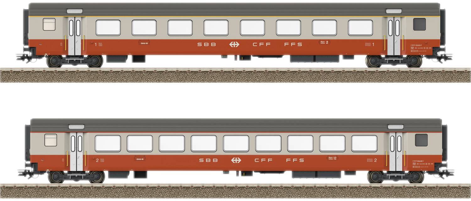 Two railway carriages in red and grey with the inscription 'SBB CFF FFS', standing on a track.