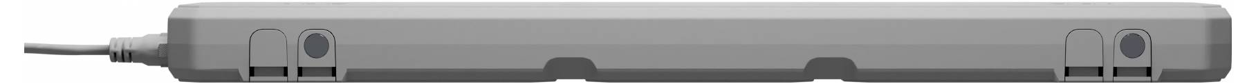 A grey, rectangular extension socket with multiple plug sockets and an attached cable.