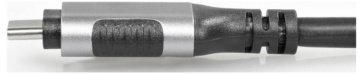 Close-up of a cable with black and silver sheathing and a rectangular connector. Suitable for electronic devices.