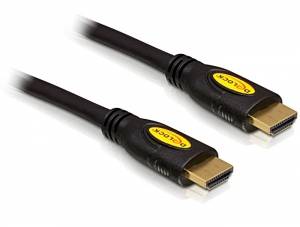 Two black HDMI cables with gold-plated connectors are lying next to each other.