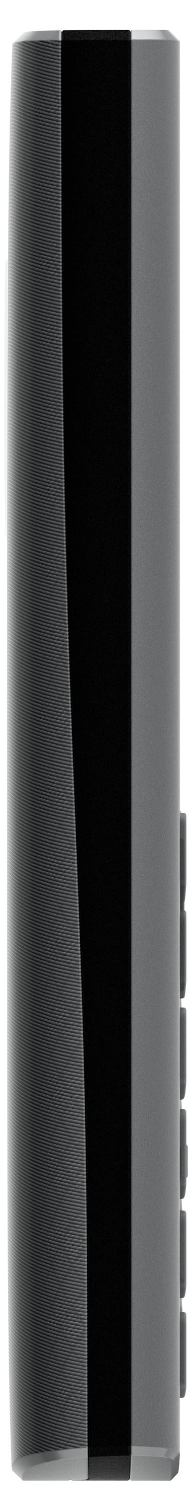 Side view of a slender, black remote control with few buttons, conveying minimalism and modern technology.