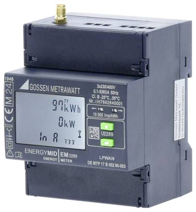 An energy watt digital meter displays the following information: '9.71 kWh', '0 kW', 'In A'. Further technical details are visible on the casing.