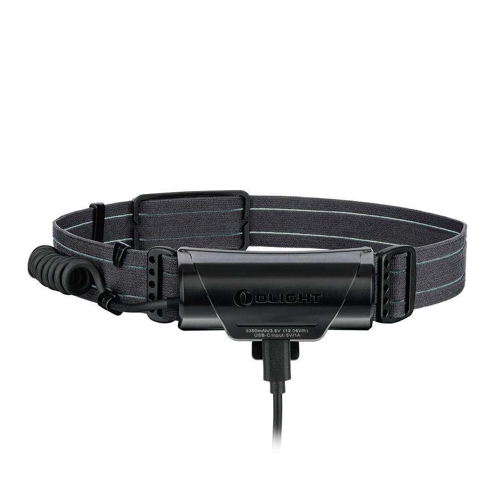 Black and grey belt with integrated, detachable plastic device and cable connection at the bottom. Versatile adjustability.
