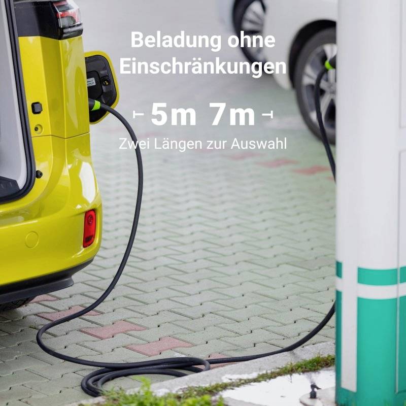 An electric car is being charged at a charging station. A sign reads: 'Charging without restrictions, two lengths available, 5m, 7m'.