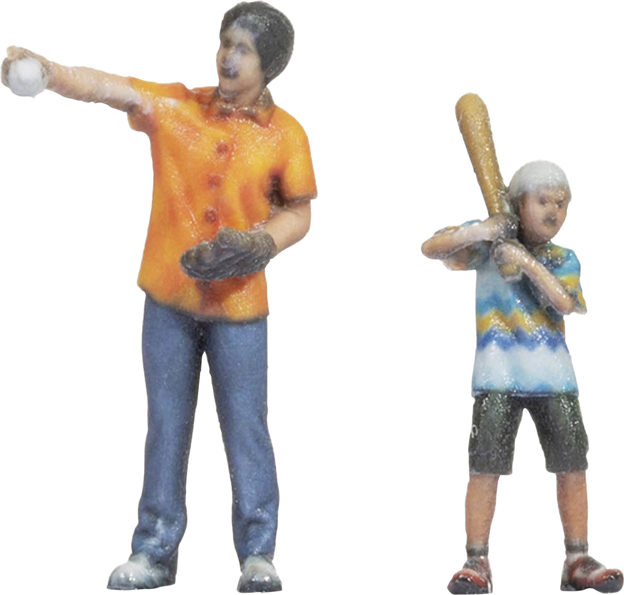 An adult standing upright points in one direction, while a child holds a baseball bat. Both are wearing casual clothing.
