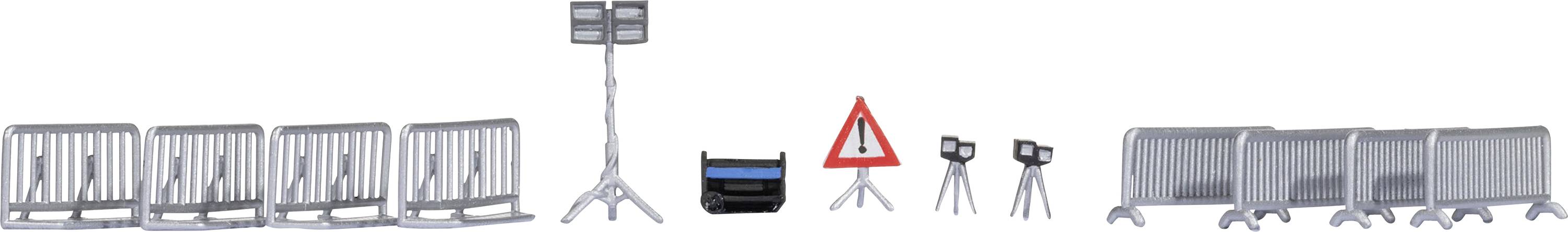 Safety equipment including guide cones, barriers, headlamps and a warning sign with an exclamation mark.