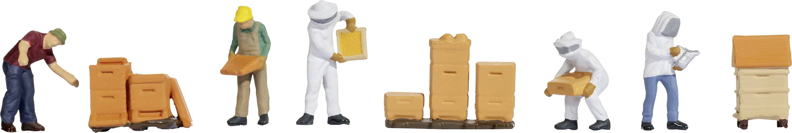Several miniature figurines depict the process of beekeeping, from preparation and donning protective clothing to working with beehives.