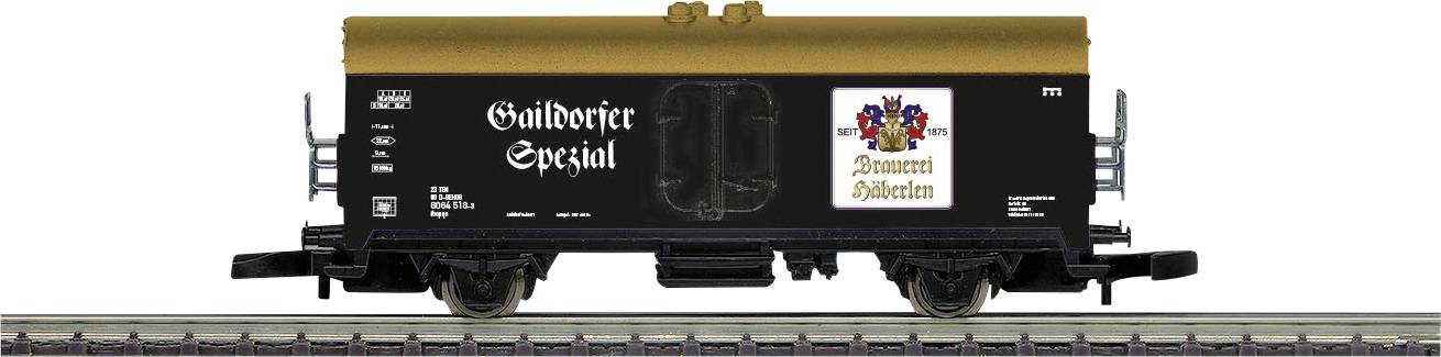 Black goods wagon with a brown roof, inscribed with 'Gulden Draak', decorated with a coat of arms, standing on railway tracks.