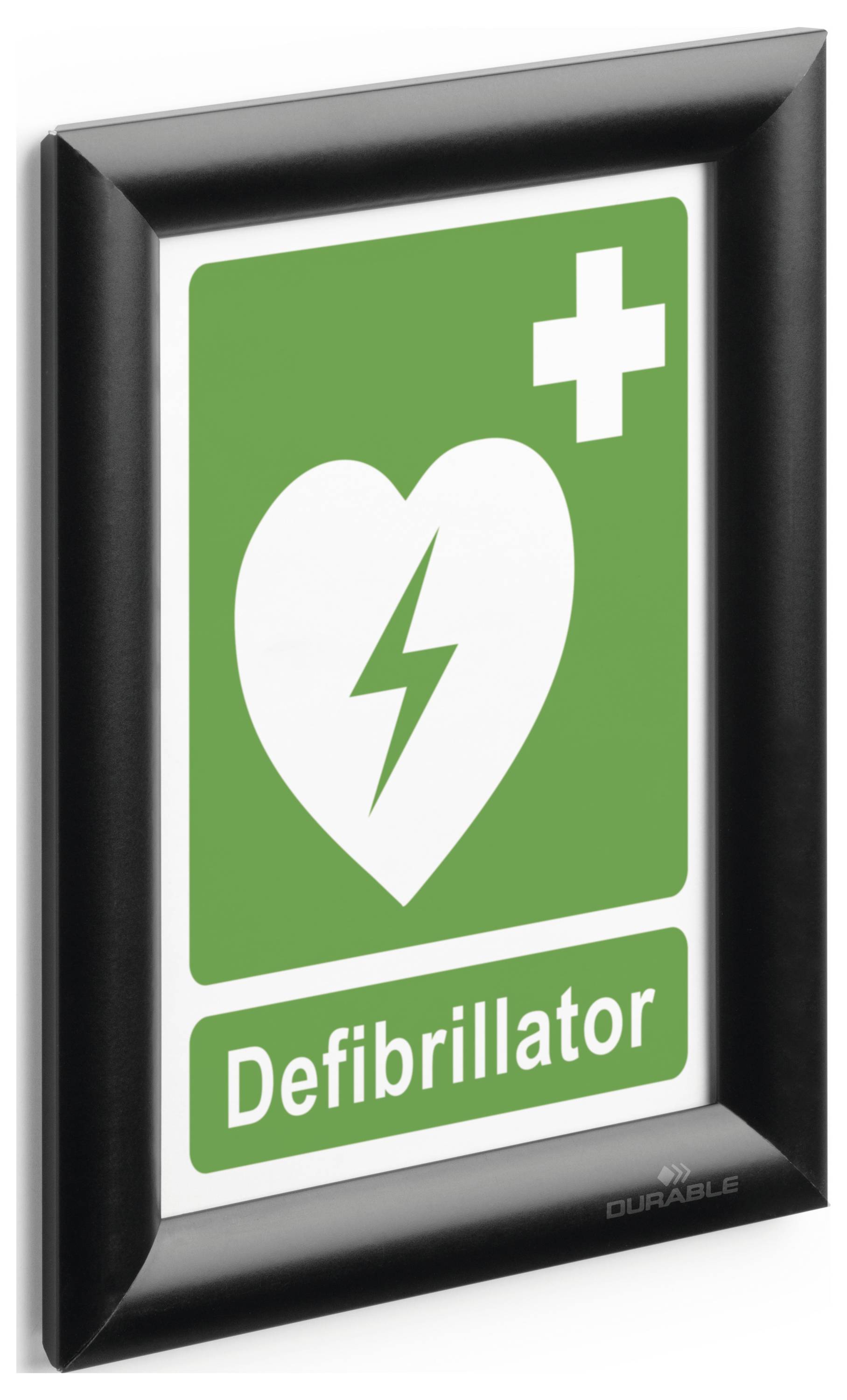 A sign with a heart symbol and a lightning bolt, indicating the location of a defibrillator. A green cross is also depicted.