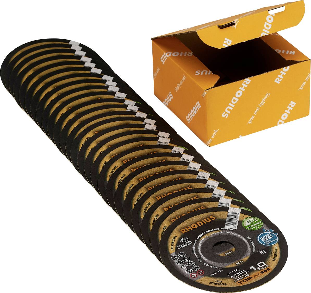 A stack of grinding discs next to an opened orange Rhodius packaging.
