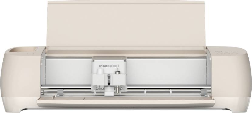 Cutting plotter in light beige, model 'Cricut Explore 3', with open lid. Suitable for precise cutting work on various materials.