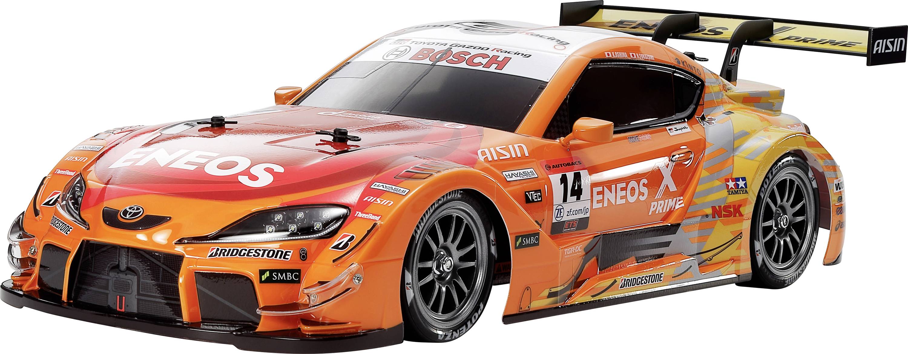 An orange and black racing car model with sponsor logos, aerodynamic design, and a large rear spoiler on a white background.