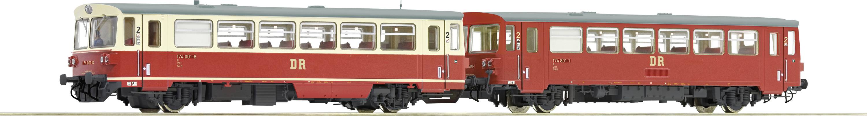 A red and beige nostalgic train with multiple windows and the inscription 'DR'.