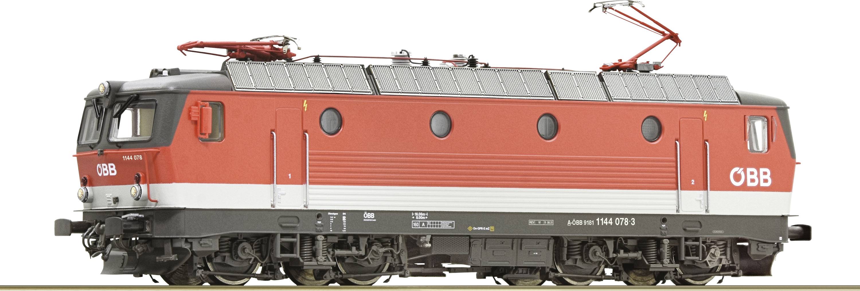 Red electric locomotive of the Austrian Federal Railways with black and grey details, standing on a track; side view.