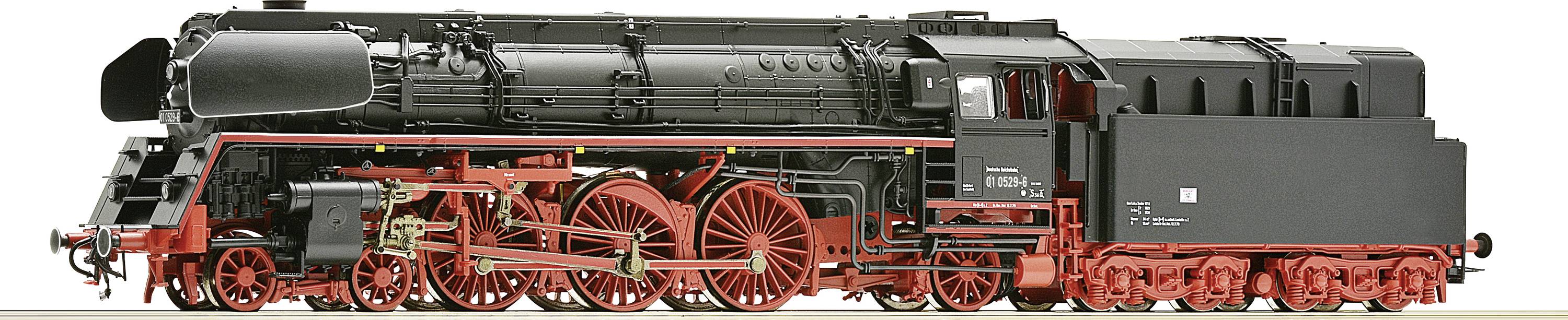 A black steam locomotive with red wheels and connecting rods. Steam locomotive positioned sideways to the camera, with detailed visibility.