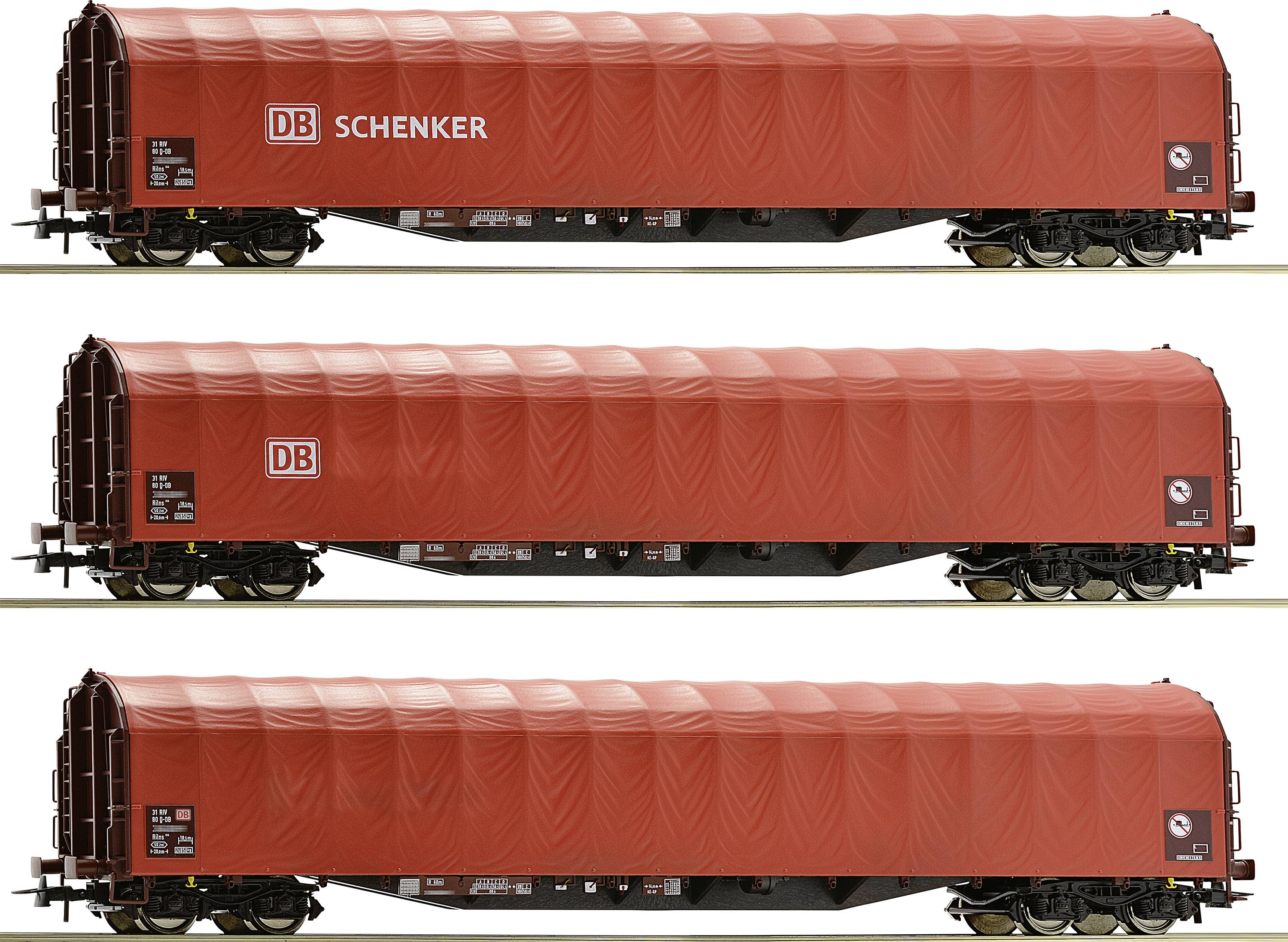 Three red freight wagons with the inscription 'DB Schenker' and 'DB' on their sides, set against a neutral background.