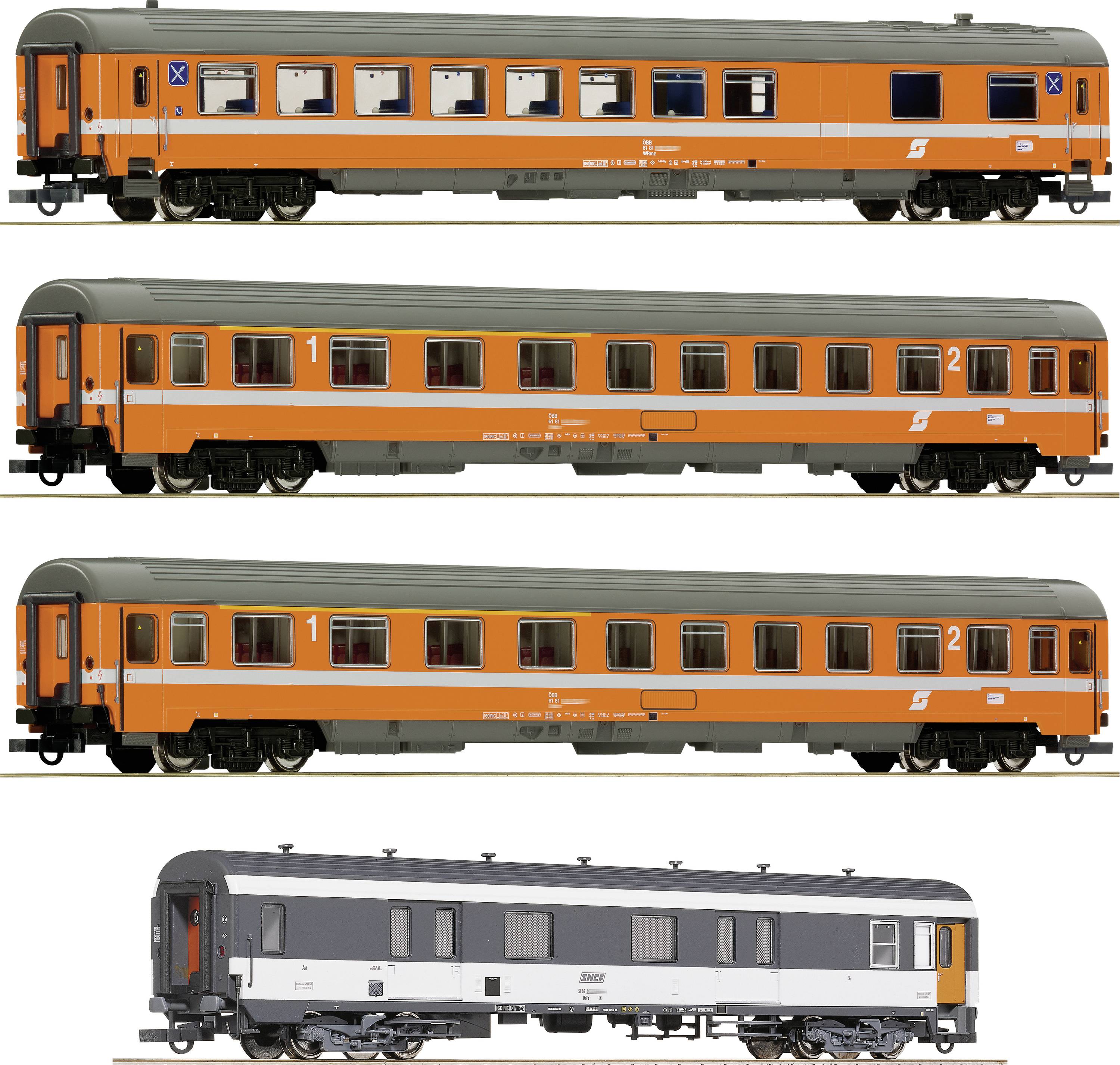 Four model passenger carriages painted orange and grey standing in a row, with a grey goods wagon positioned underneath.