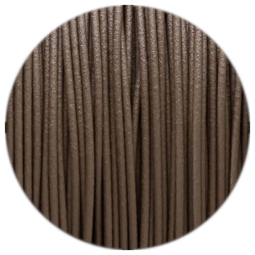 Close-up of brown cable or thread, textured and uniform thickness, circular image crop.