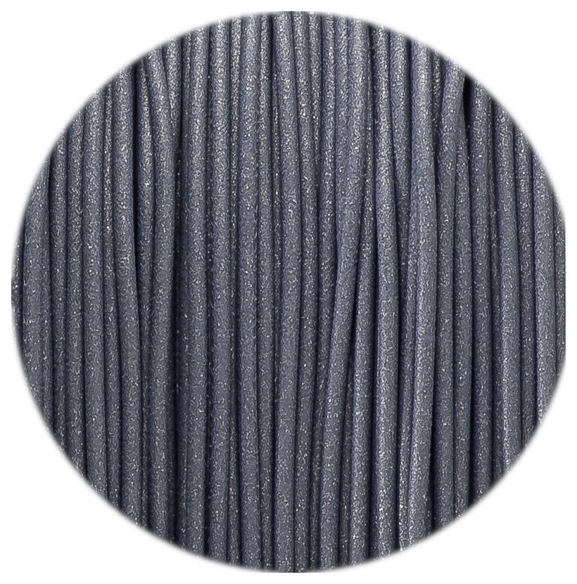 A bundle of gray, vertically running leather straps in macro view, showing the structure and details of the material.