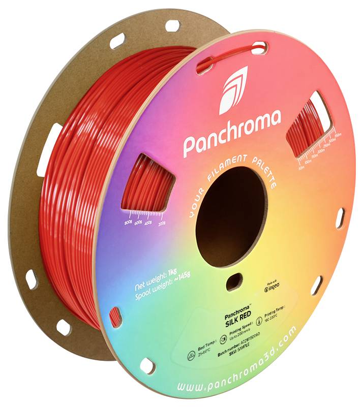 A spool of red 3D printer filament from Panchroma, colorful packaging with 'Silk Red' label, weight: 1kg.