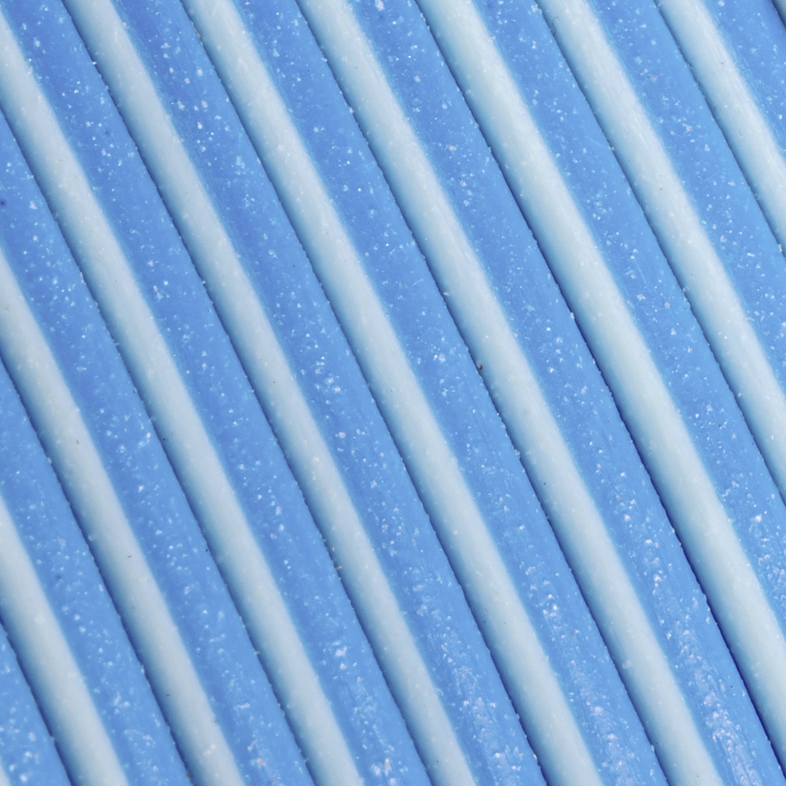 Blue, diagonally running stripes on a surface that are structured and regularly arranged.