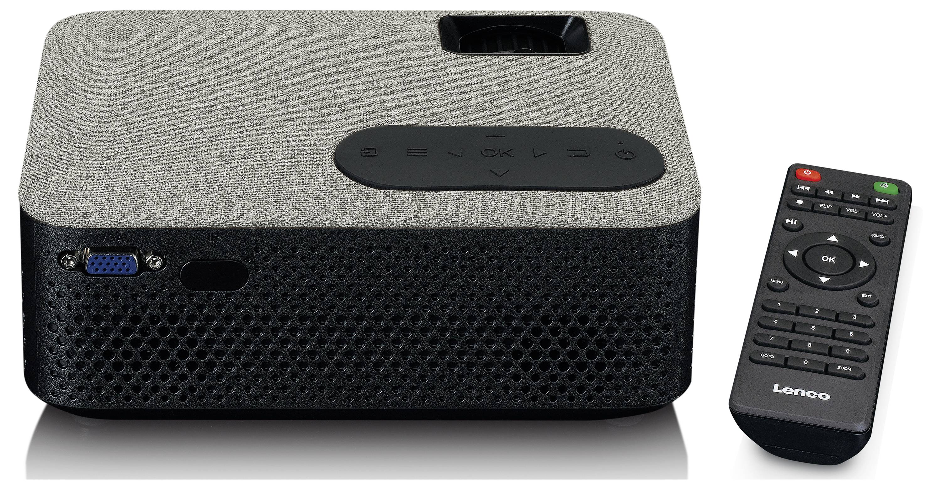 Grey and black projector with textile surface, VGA port on the left, black remote control with colourful buttons on the right.