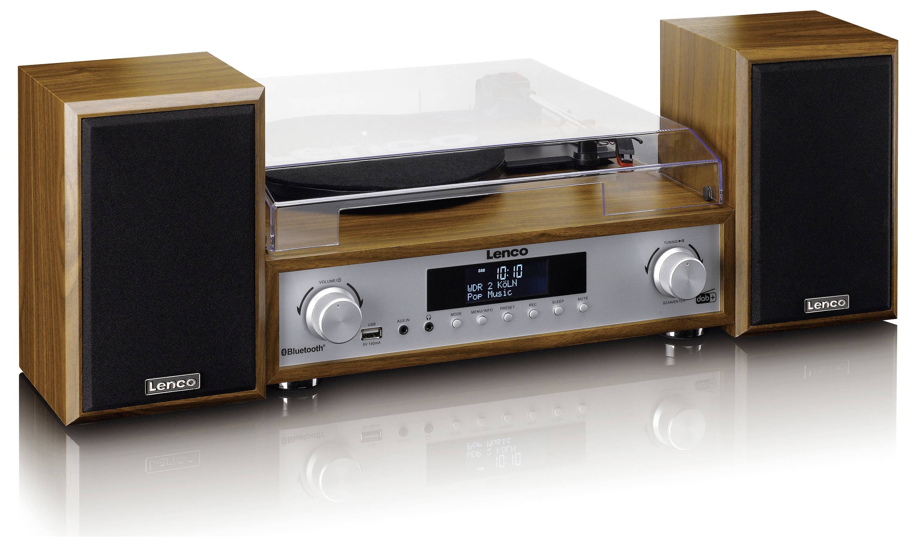 A retro record player with two brown speakers. The device has a silver control panel with rotary knobs and a digital display.