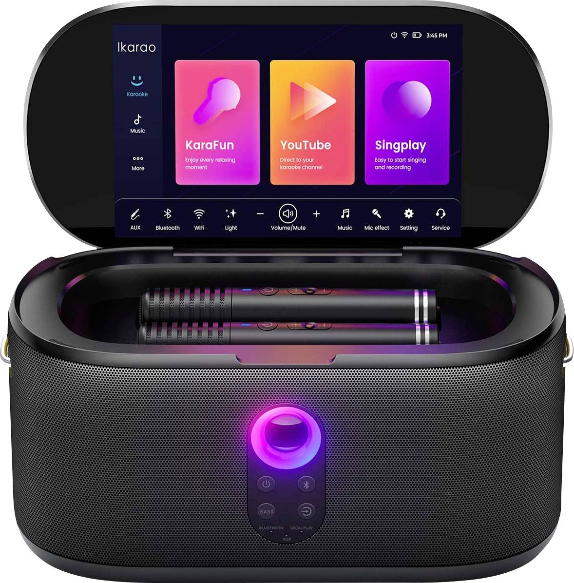Portable karaoke speaker with built-in screen displaying 'KaraFun', 'YouTube', and 'Singplay' apps. Two microphones are placed inside.