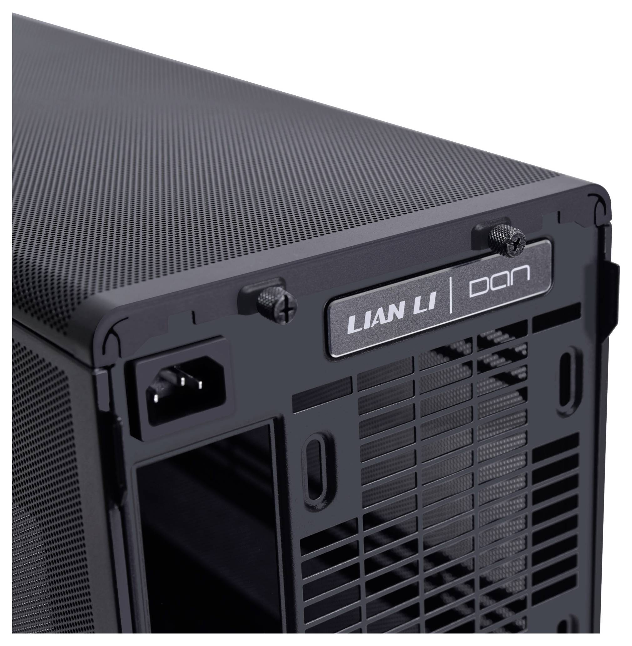 A closed computer case frame by Lian Li. The top and rear sides with ventilation grilles and nameplate are visible.