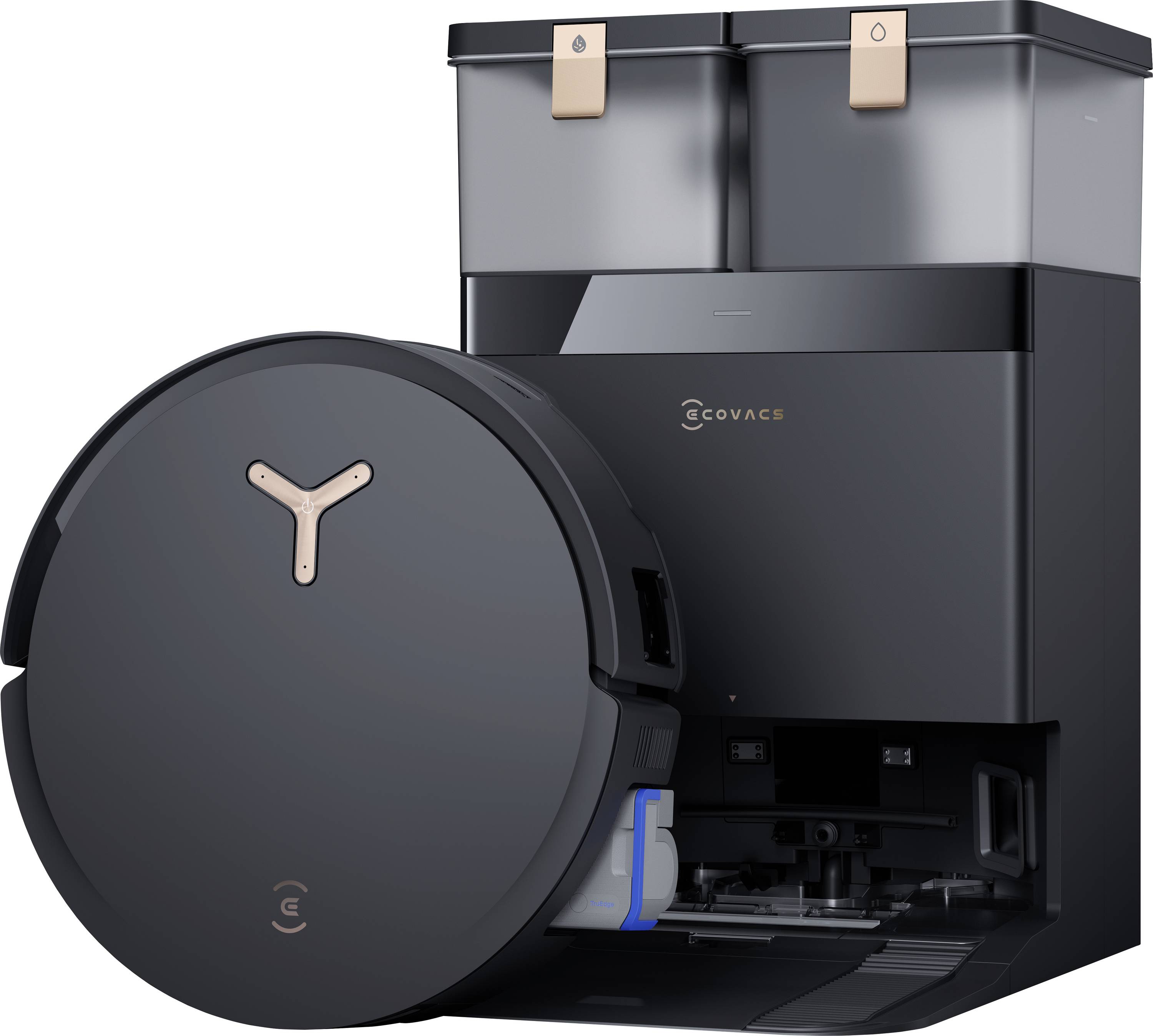 A round robotic vacuum cleaner in front of a charging station with two containers, presumably for dust and water. The robot has a modern design.