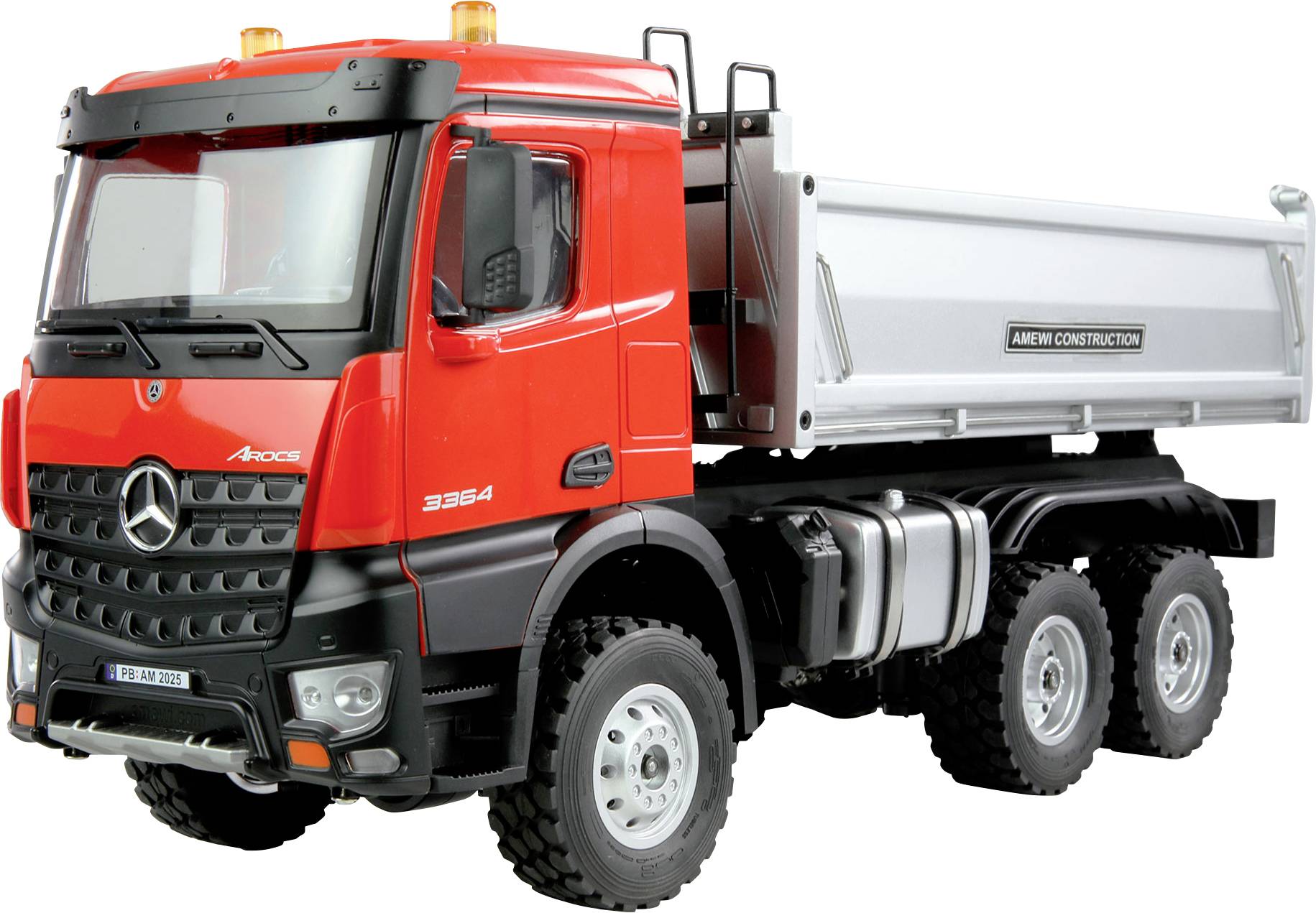 Red lorry with grey cargo area, Mercedes-Benz logo visible at the front. Secured with construction equipment.