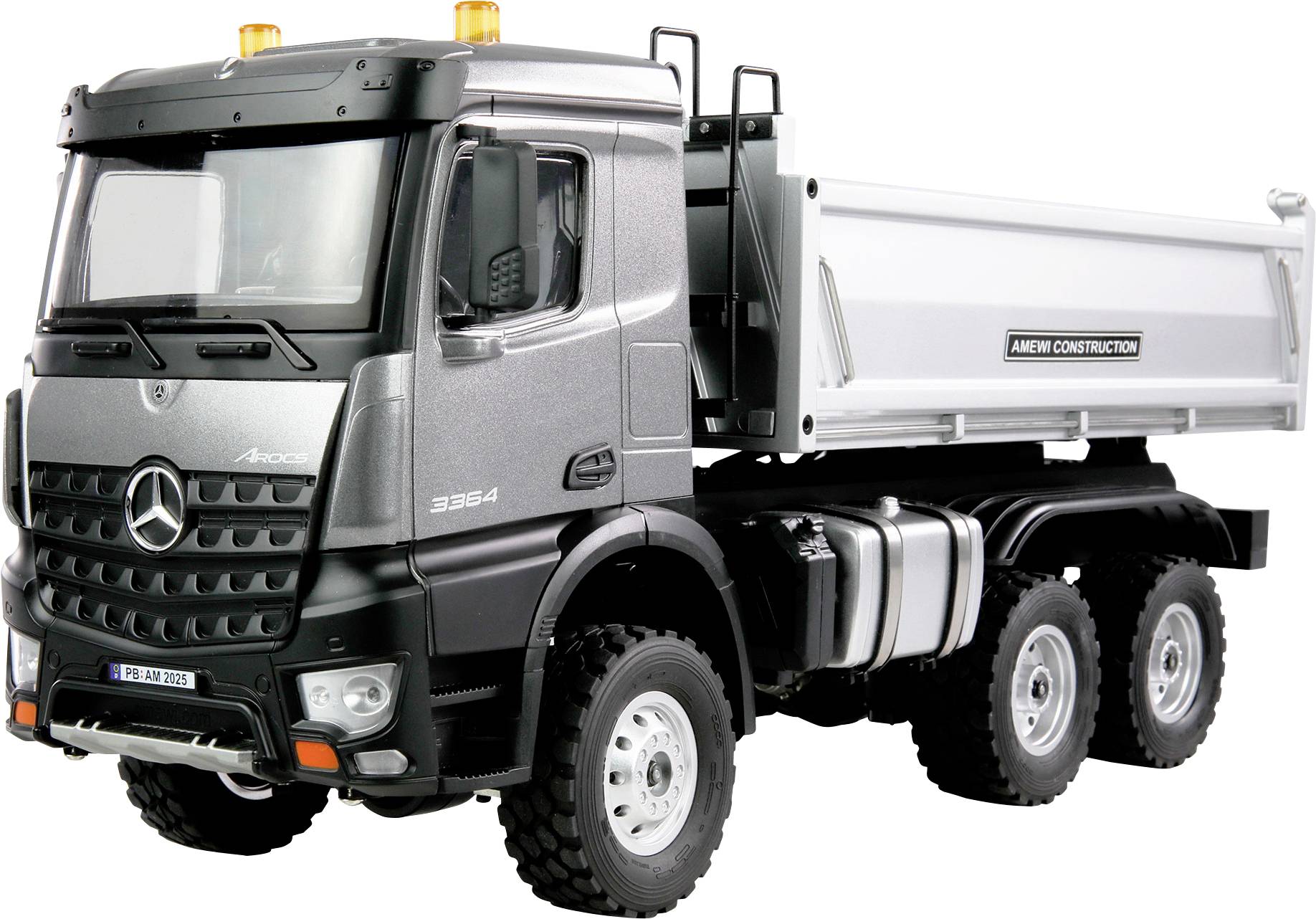 A silver toy lorry with a Mercedes logo, yellow beacons on the roof, and the inscription 'Arocs 3363' on the side.