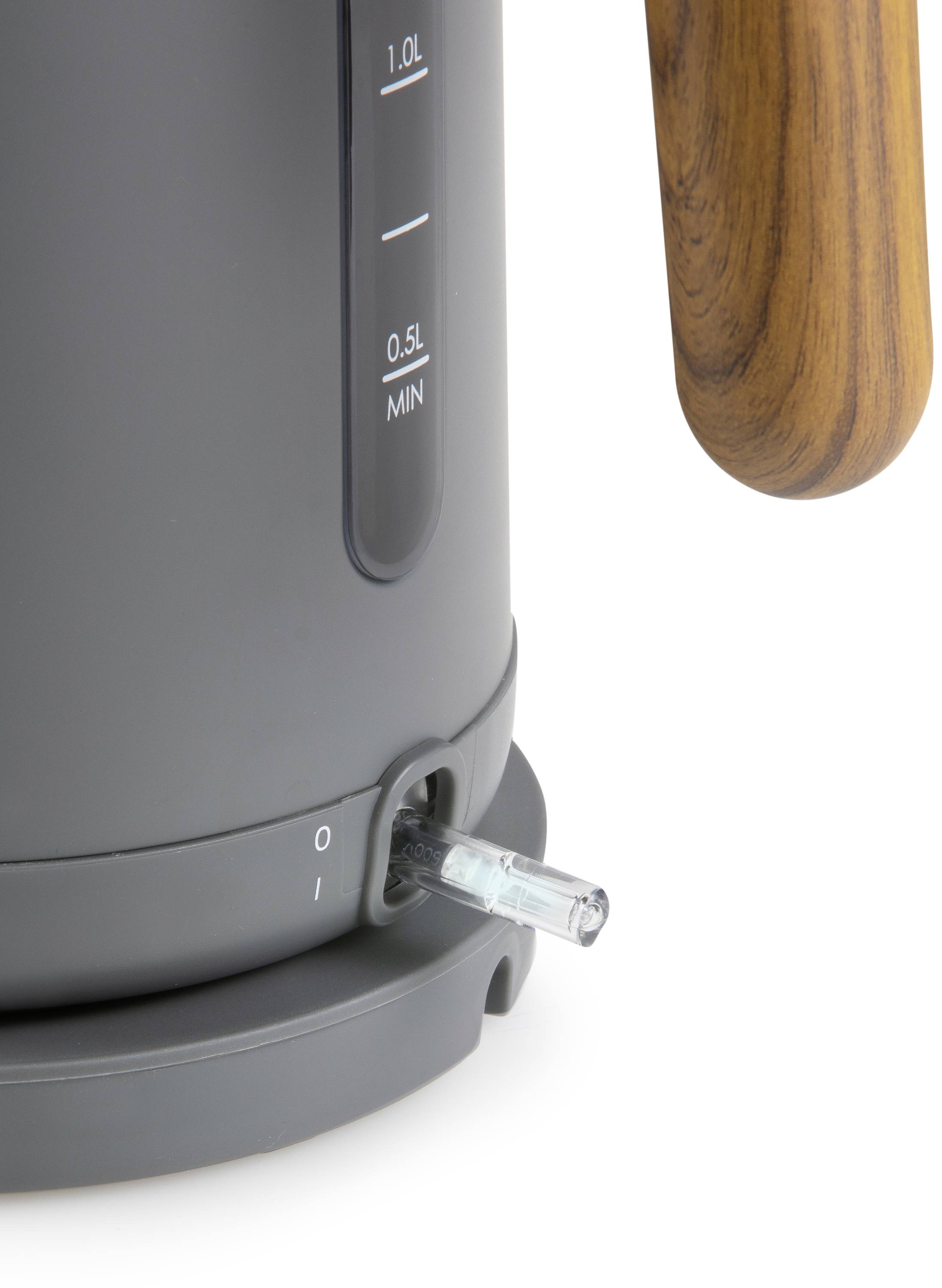 'Close-up of a grey kettle with a wooden handle, with the power button set to the 