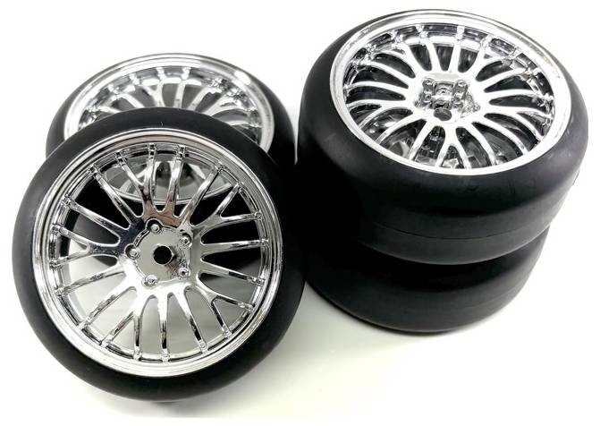 Four gleaming, silver alloy wheels with black tyres on a white background, suitable for model cars or toy vehicles.