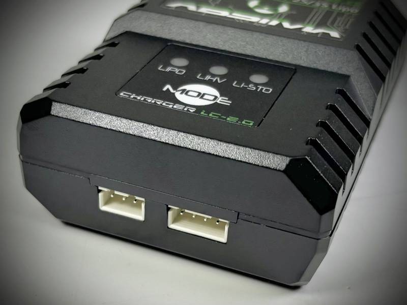 A black charger with two USB ports on the front. Three LED indicators are located on the top, labelled 'LiPO', 'LiHV', 'LiFTO'.