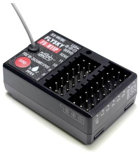 Receiver module with multiple connection pins and cable; labelled 'FS-iA6B FLYSKY'; used for remote control of model vehicles.